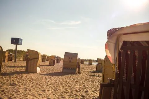 Beach chairs on the beach in the sunlight Stock Photos