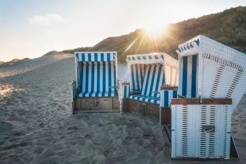 Beach chairs on empty beach on Sylt island Stock Photos