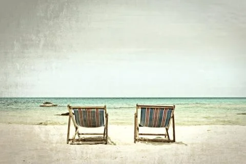 Beach chairs processed in old style Stock Photos