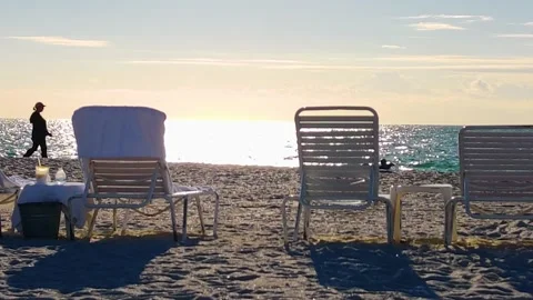 Beach chairs walking Stock Footage 221444387