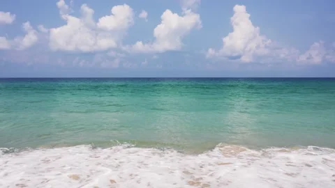 Beach with clean ocean and blue sky in Thailand Stock Footage 217691231