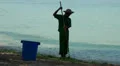 Beach cleaner & Souvenir Sellers HD Footage