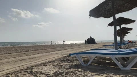 Beach Cleaning Machine Working Along the Shore in Djerba Stock Footage 342230241