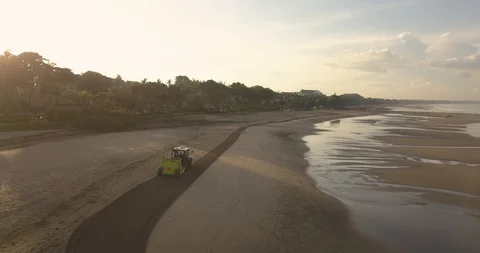 Beach cleaning tractor in Kuta Stock Footage 128652920
