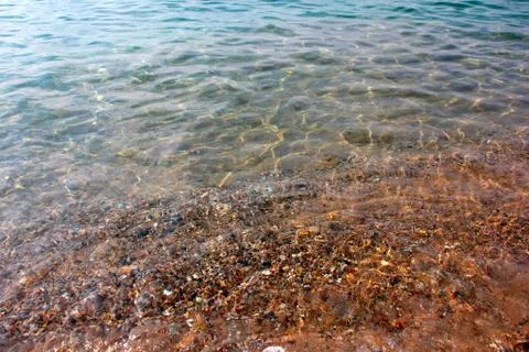 Beach with clear sea Stock Photos