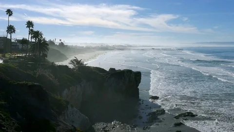 Beach Cliff and Pier Stock Footage