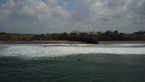 Beach with a Cliff and Waves in Bali Indonesia Yeh Ganga Beach Stock Footage 101789494
