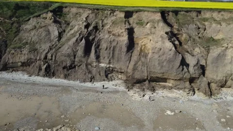 Beach with cliffs filmed with drone. Stock Footage 188843351