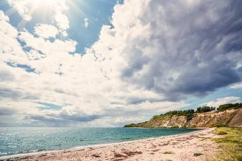 Beach with cliffs on a scandinavian seashore Stock Photos