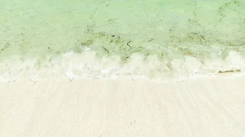 The beach with close up the sand and wave Stock Footage 220642739