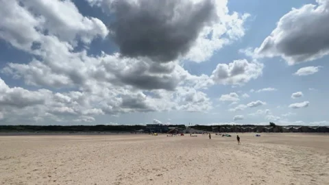 Beach with clouds hyperlapse loop Stock Footage 248760273