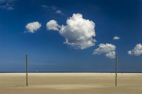 Beach, clouds over the sea Stock Photos
