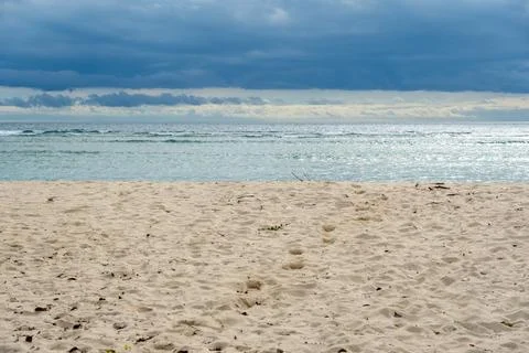 Beach with a cloudy sky in the background Foto stock