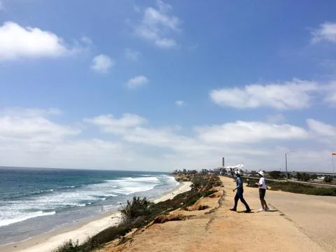Beach coastline with airplane Stock Photos