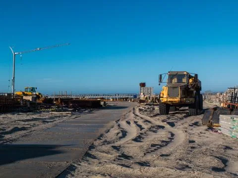 Beach with construction work Stock Photos