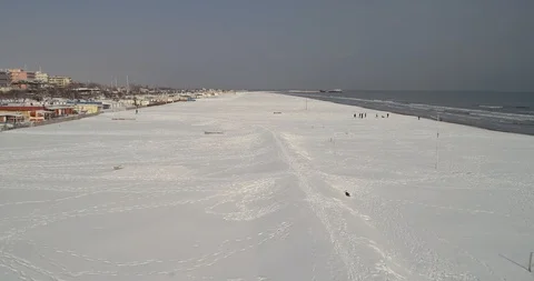 Beach covered with snow drone view 스톡 동영상 127983200