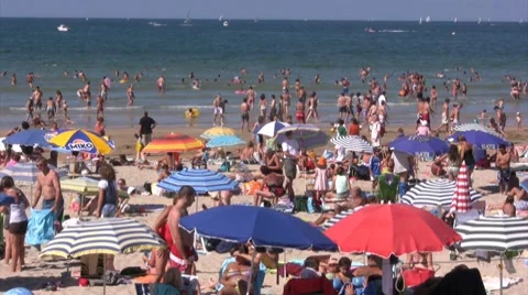 Beach crowd during summertime Stock Footage