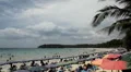 Beach crowd in the summer, People Swimming, Tanning, Playing, Water Sports HD Footage