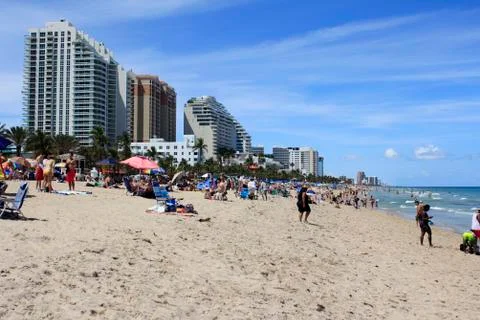 Beach crowded with spring vacationers Stock Photos