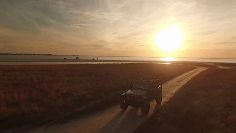 Beach cruise in jeep Stock Footage 90670056
