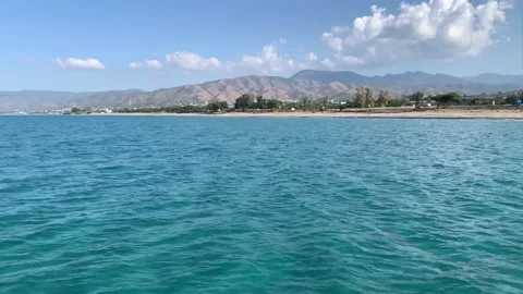 BEACH Cyprus Polis shot of an empty lonely pebble beach during the day . View fr Stock Footage 221610591
