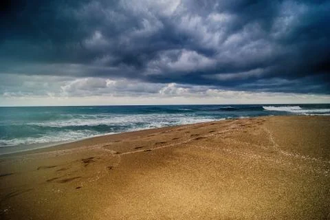 Beach dark blue Stock Photos
