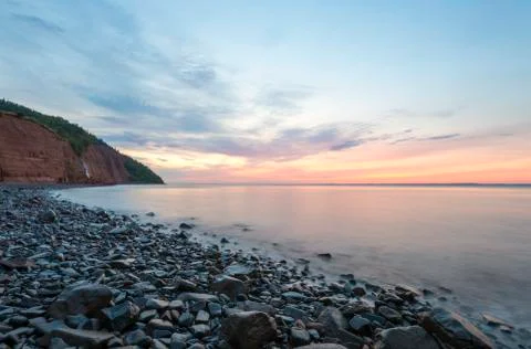 Beach at dawn Stock Photos