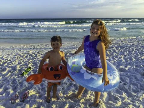 Beach Day Fun with Floaties Foto stock