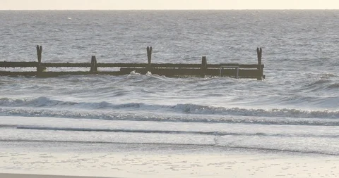 Beach Defence at sunrise Vídeo Stock 124979822