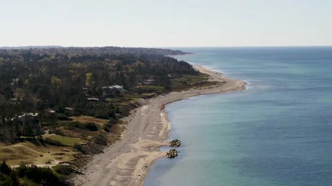 Beach in Denmark on a beautiful spring day, drone stock footage 1 Stock Footage 139932490