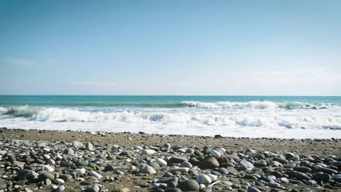 A Beach With Different Sizes Of Pebbles Stock Footage 147327611