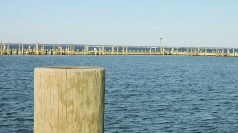 Beach dock during the summer with blue ocean Stock-Footage 75176346