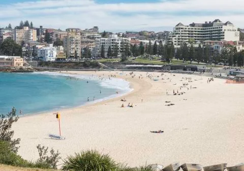 The beach with downtown 2 Stock Photos