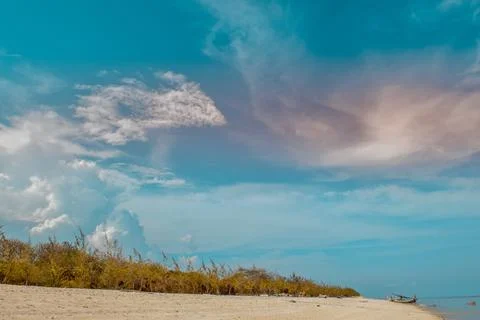 Beach with a dramatic and beautiful sky Stock Photos