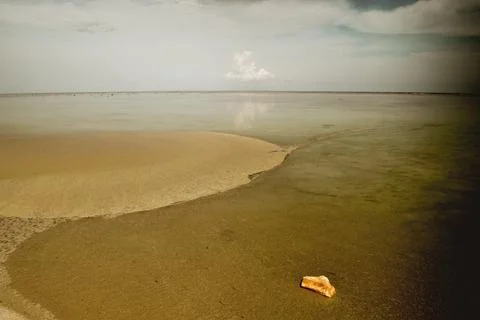 Beach with a dramatic and beautiful sky Stock Photos