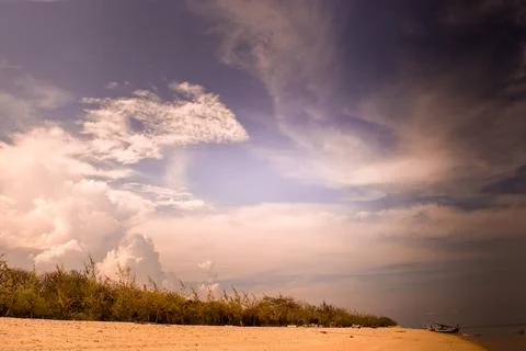 Beach with a dramatic and beautiful sky Stock Photos