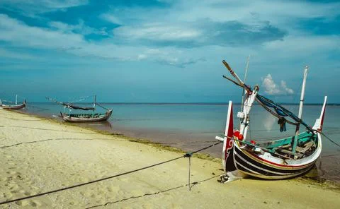 Beach with a dramatic and beautiful sky Stock Photos