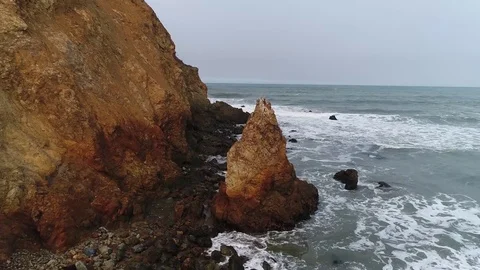 Beach Drone Aerial Flight Forward Over Rocks Pacifica California Stock Footage 82546420