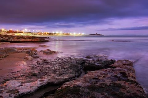 Beach at dusk Stock Photos