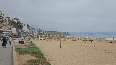 Beach Edge Path and Cyclist at Reñaca, Viña del Mar, Chile 8K Stock Footage 331545238