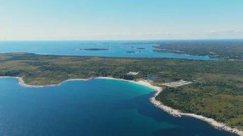 Beach With Emerald Ocean Waters And Islands Crystal Crescent Beach, Nova Scotia Stock Footage 317901556