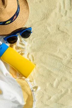 Beach Essentials with Hat, Sunglasses and Sunscreen  Summer Vacation Flatlay Stock Photos