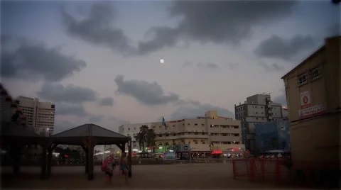 Beach in the evening and the moon in the sky Video stock 40013703