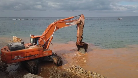 Beach excavator Stock Footage 121228180