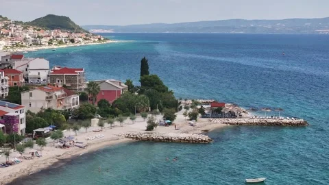 Beach Facility And Swimmers Along The Podstrana Coast, Croatia Stock Footage 342147105