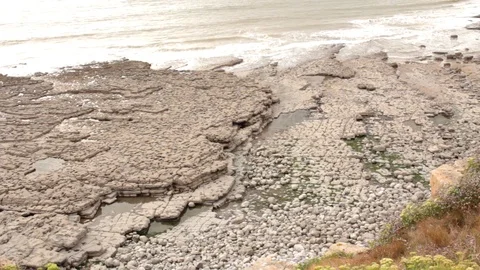 A Beach Filled With Rocks Stock-Footage 93168378