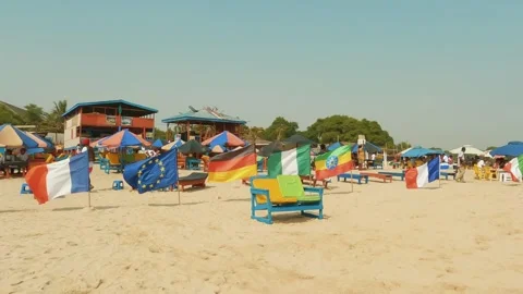 "BEACH FLAG DISPLAY: A STATIC BEACH SAND SHOT AT LABADI" Stock Footage 229127798