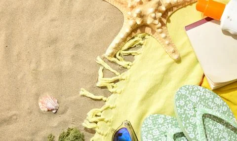 Beach Flat Lay with Starfish and Sandals 库存照片