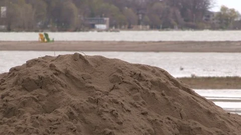 Beach flooding as lake water level rise due to climate change Stock Footage