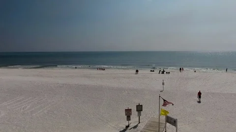 Beach fly over flag Stock Footage 80733271